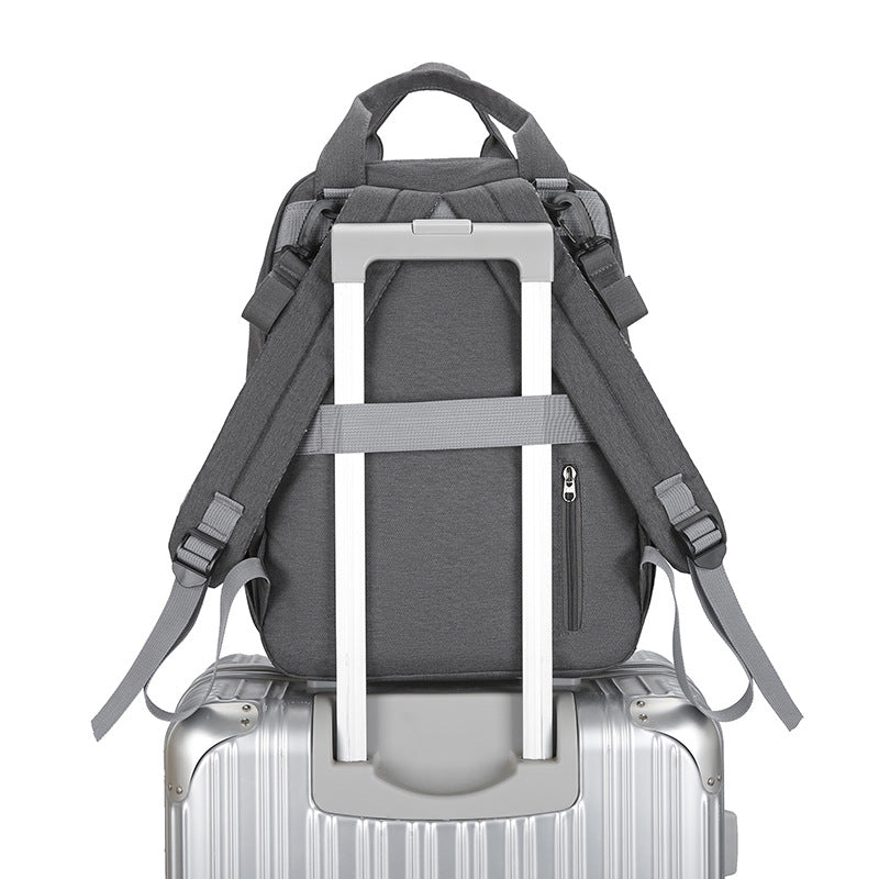 Multifunktionale Wickeltasche mit Wickelunterlage und Wärmefach